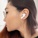 Amazfit Powerbuds Pro in woman's ear